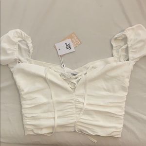 Tiger Mist white crop top